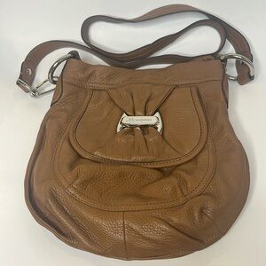 B Makowski leather hobo slouch crossbody shoulder bag in saddle brown.
